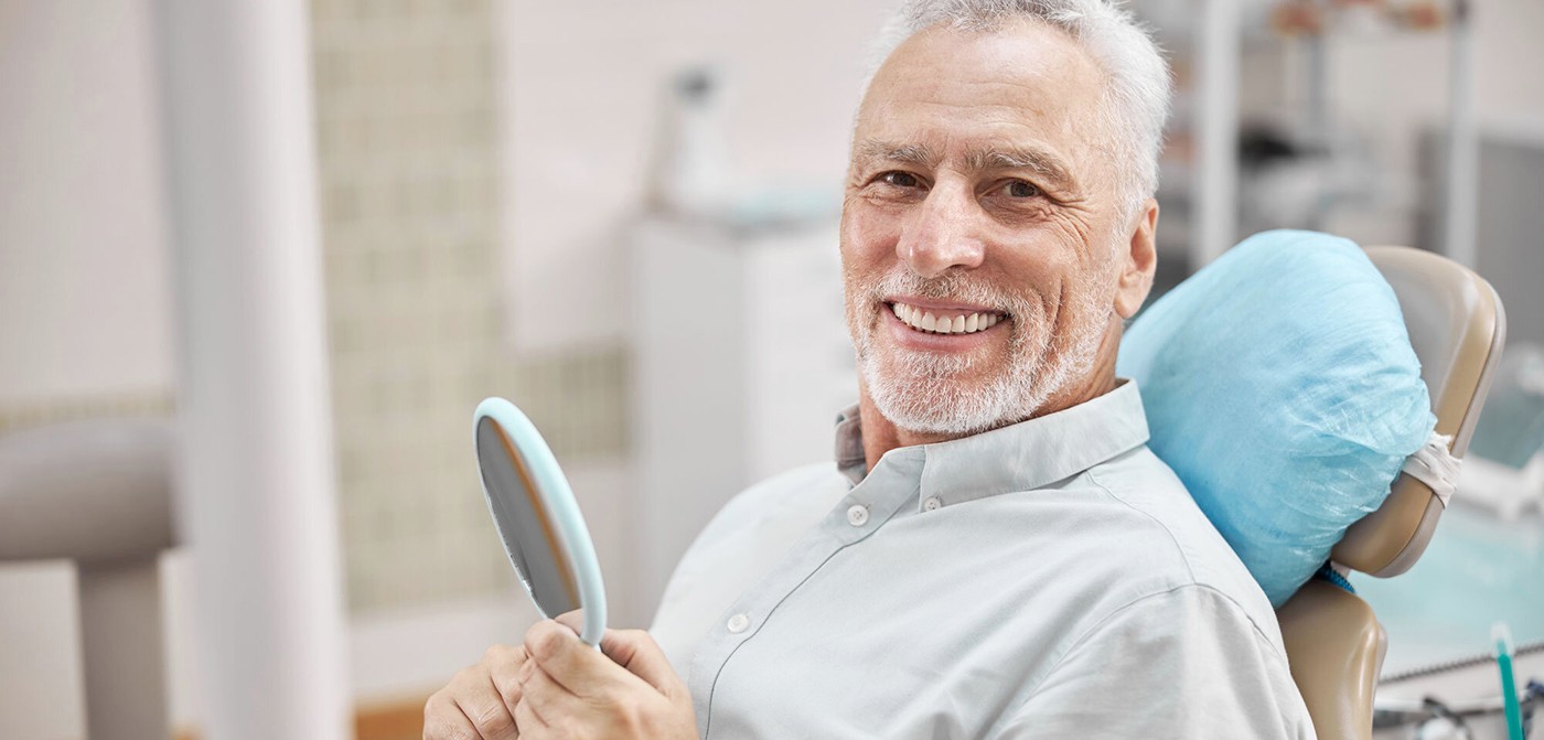 man showing approval for dental work