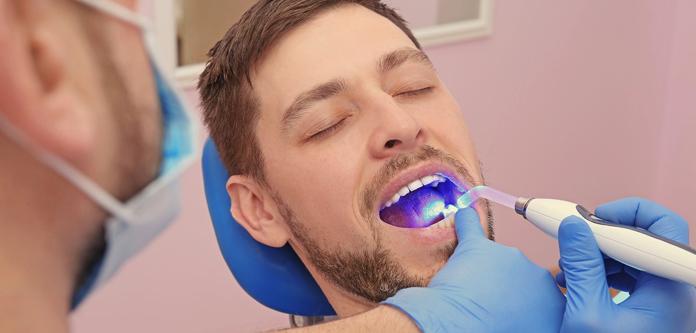 man getting work done on teeth